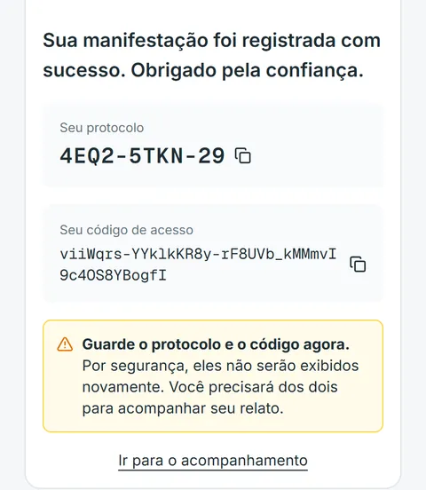 Tela de confirmação com o protocolo e o código de acesso do relato.